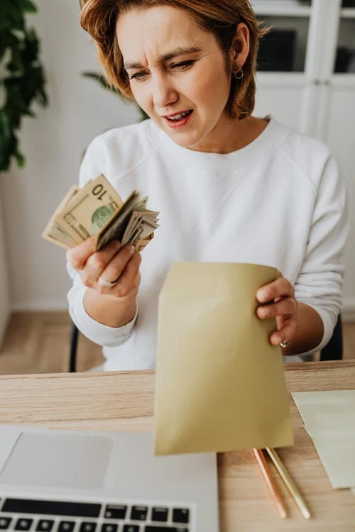 woman with money & envelope