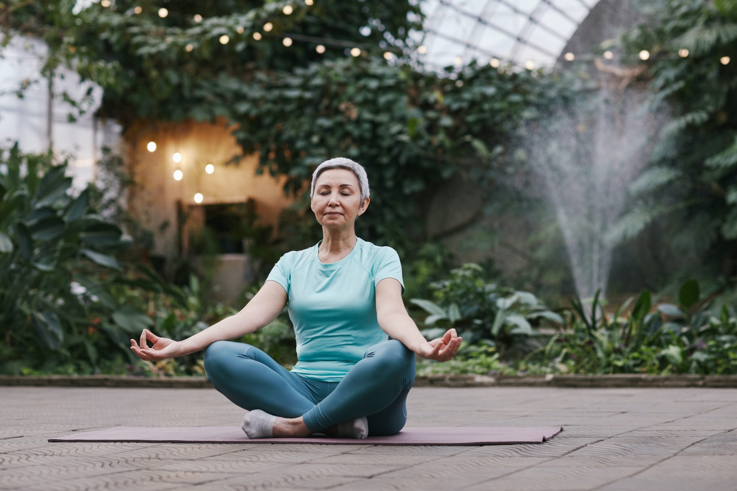 Woman seated in yoga meditation pose