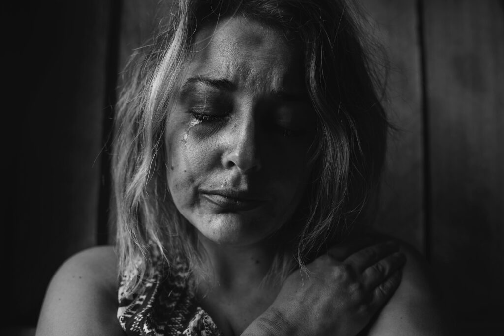 Abused woman crying